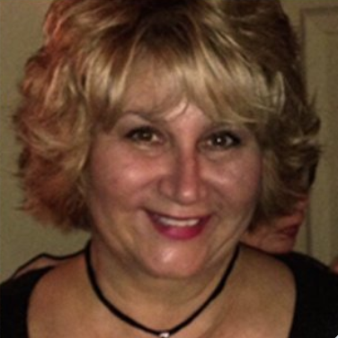 Headshot of article author Monica Progar. Article author Monica Progar profile picture.