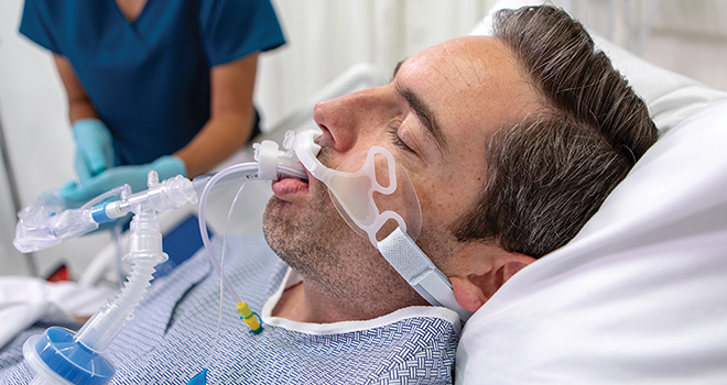 closed-suction-catheter-1 Patient with a closed suction catheter in mouth
