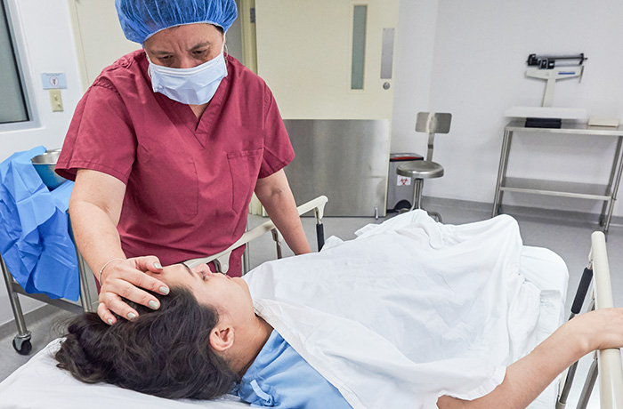 Nurse comforting patient