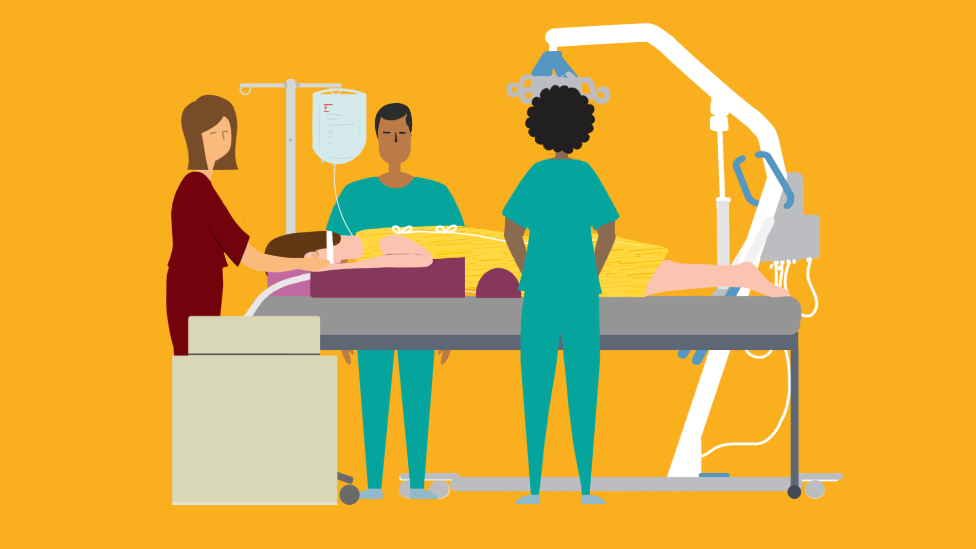 Three caregivers and a prone patient