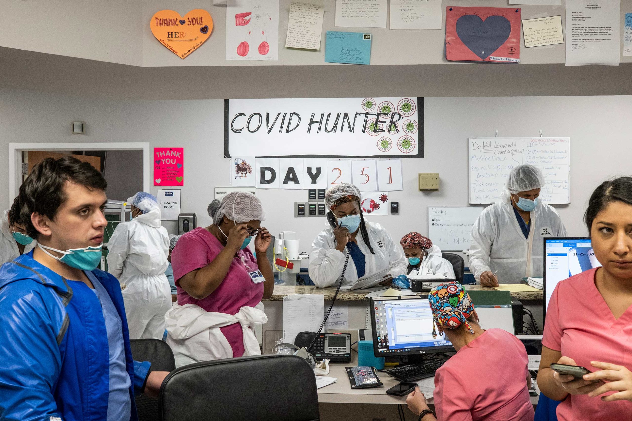 Hospital workers at nurses station