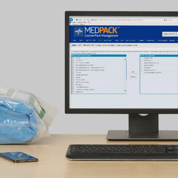 A computer monitor with MedPack software on the screen.