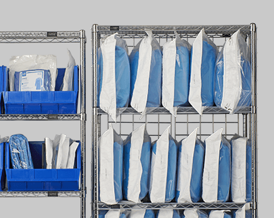 Wire shelving with surgical packs.