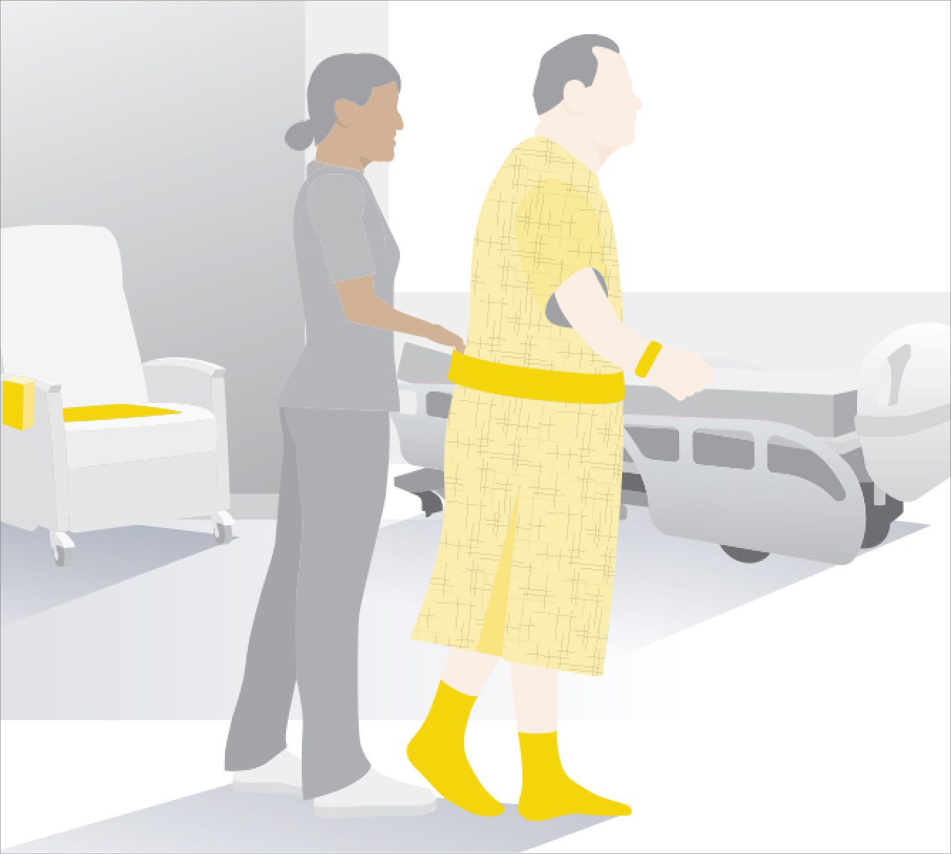 Caregiver in grey scrubs holding patient in a yellow gown with a gait belt