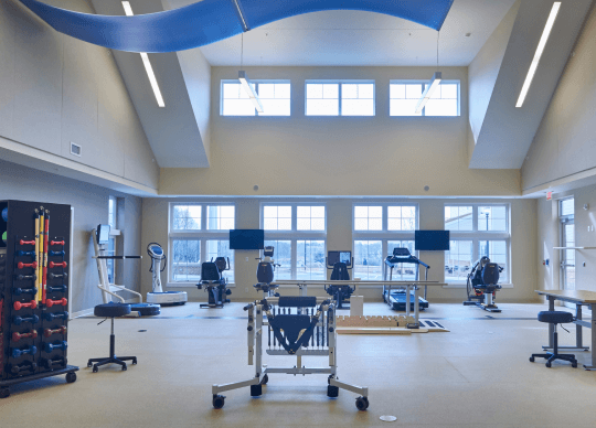 A room with physical therapy equipment