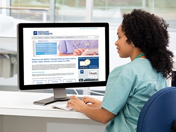 ensure-frontline-1-min Female caregiver uses a desktop computer to take a continuing education course