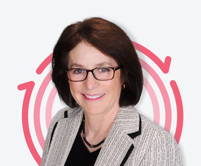 Headshot of Catherine T. Milne with three pink concentric circles in the background