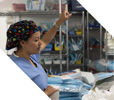 one-world-banner-surgery-case-study nurse going through her supplies