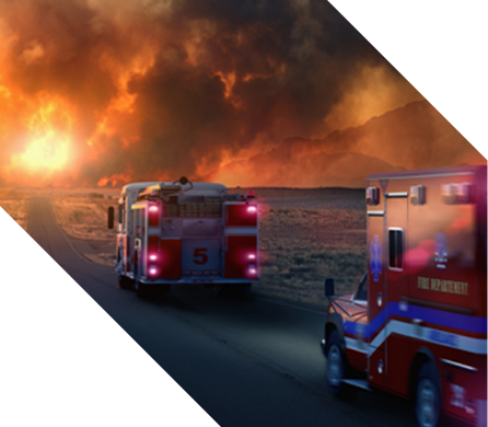 Ventura Case Study Firetrucks racing down the highway toward a wildfire
