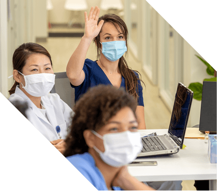 standardisation-bnr nurses listing to someone and raising their hands