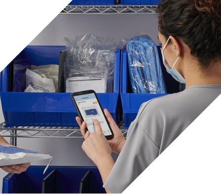 woman verifying inventory tracking on her iphone