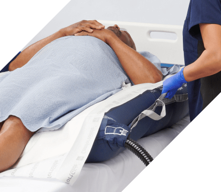 Caregiver moving patient with a patient repositioning system