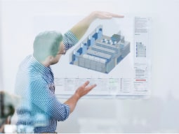 customized-sol-1-min photo of a man showing a warehouse space design