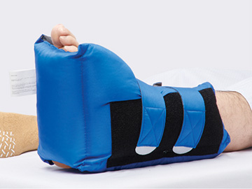 HeelMedix Basic Heel Protector, the most cost effective boot, applied to patient’s foot