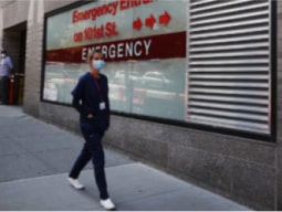 stay-info-3-min photo of a caregiver walking an empty street in NYC during COVID