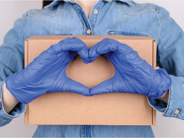 lessons-from-covid glove hands making the sign of a heart over a custom kit