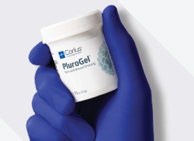 Clinician’s gloved hand holds effective surfactant for removing debris in wound care