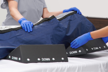 Heel offloading boot with three color-coded DVT tubing ports 