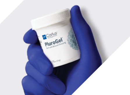 Clinician’s gloved hand holds effective surfactant for removing debris in wound care