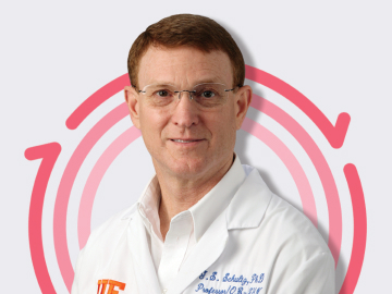 Headshot of Dr. Gregory Schultz, man wearing lab coat, in front of Skin Health logo