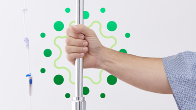 Hand on IV pole