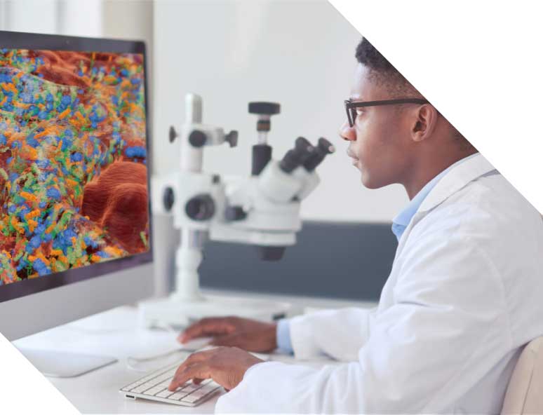 Clinician looking at screen with simulated close-up of biofilm