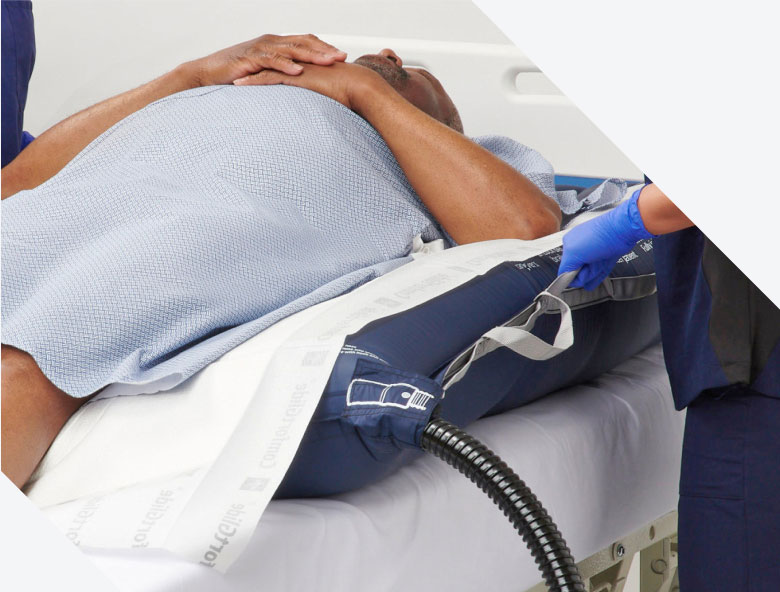 Caregiver moving patient with a patient repositioning system