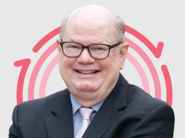 Headshot of Dr. Joyce Pittman with three pink concentric circles in the background