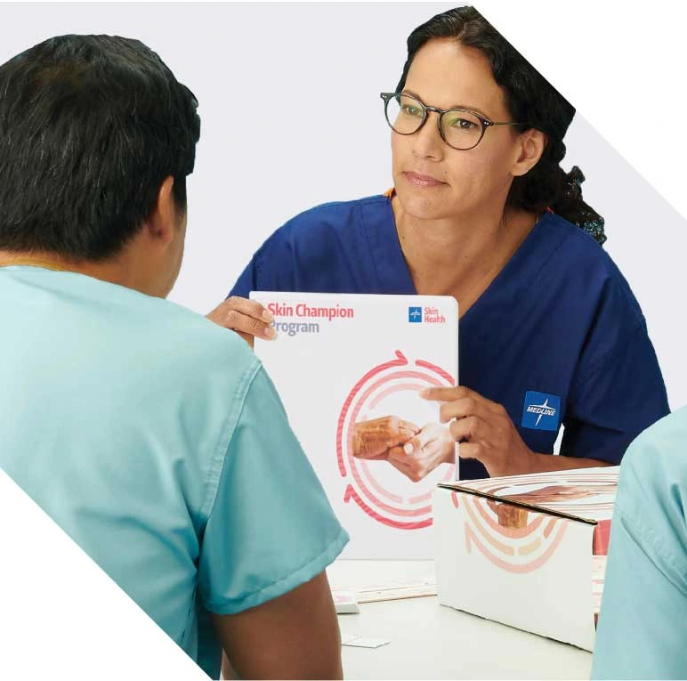 Medline representative presents Skin Champion Program training materials to healthcare professionals