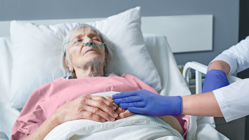 Older patient in bed