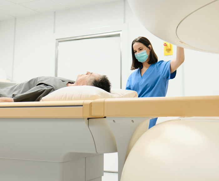 STK_ancillary team members_imaging tech_RGB Imaging technician with patient