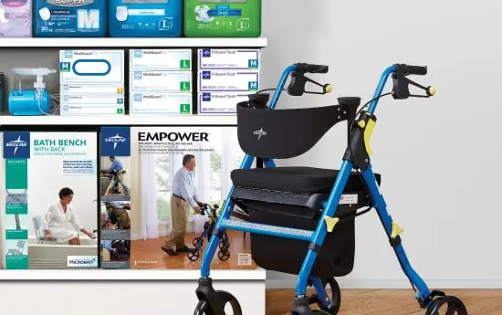 hme-form-image-min Rollator in front of store shelves of various medical products, including gloves, incontinence products, bath safety and rollators