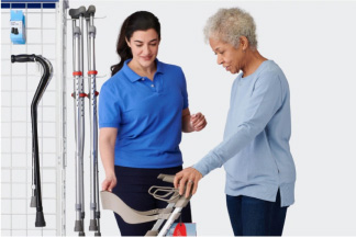 caregiver pushing an elderly man in a wheelchair