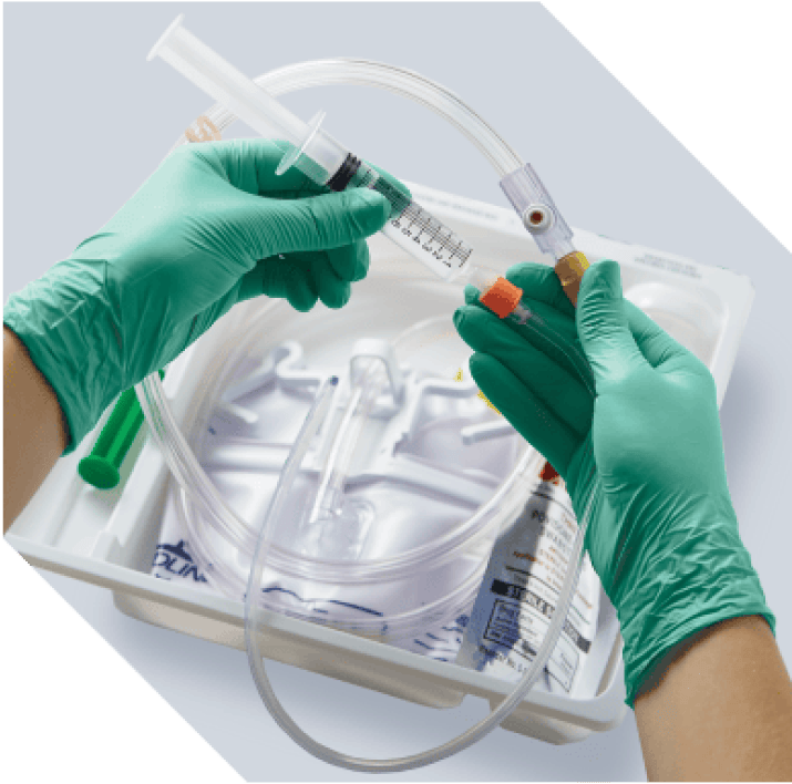 Total One Layer IUC Tray with clinician holding some components
