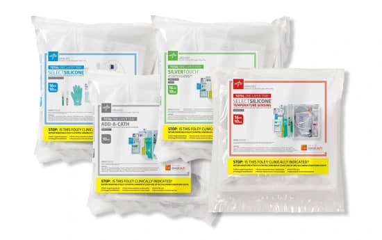 Four insertion tray packets with different types of catheters