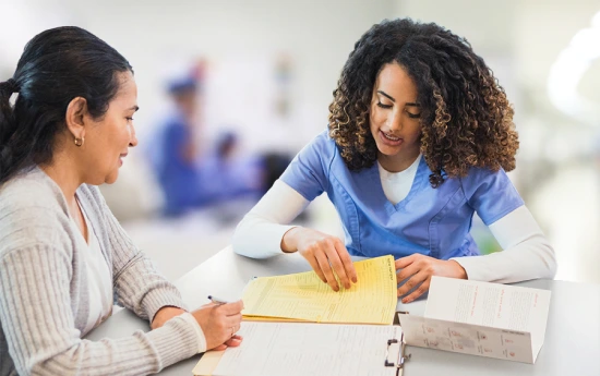 Medical supplier providing instruction to clinician