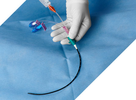 Vantex-Antimicrobial-desktop-banner Vantex CVC in gloved hand over blue sterile barrier