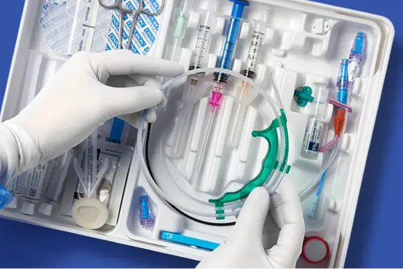 cvc_insertion_bundle_image CVC insertion bundle components and gloved hand