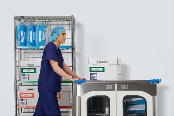 clinician pushing a cart