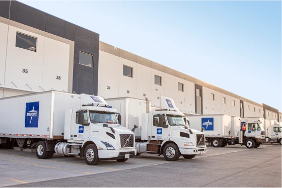 fn-make-healthcare-2 Medline trucks backed up to loading docks