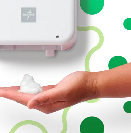 Hand with hand sanitizer under wall-hung sanitizer dispenser