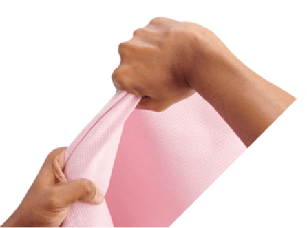 closeup of two hands pulling hard on Titan wrap to test strength