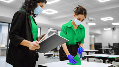 Infection Preventionist reviewing protocols with EVS staff