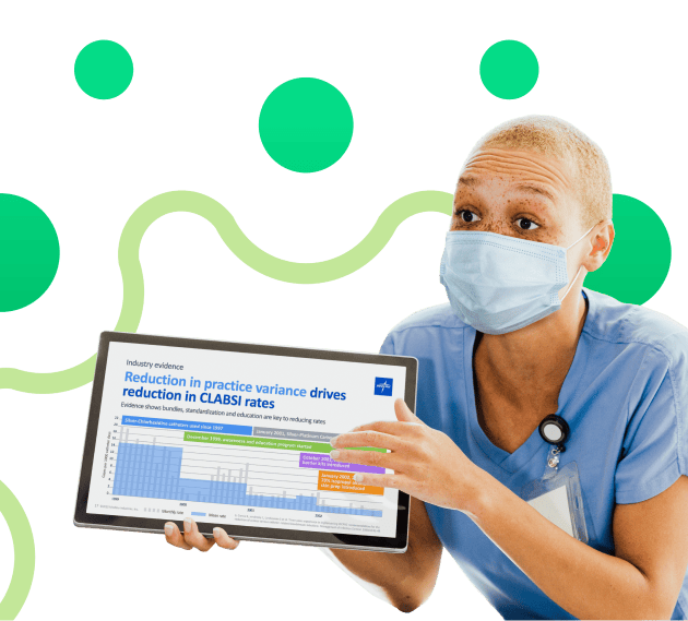 Female caregiver shows tablet with CLABSI training and information on the screen