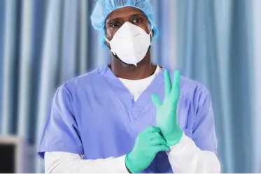 cross-contamination Person putting on gloves and mask