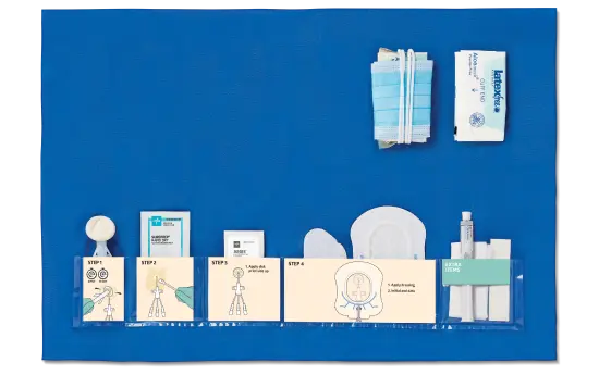 cvc-dressing Components of a CLABSI dressing change bundle are laid out on a sterile blue barrier