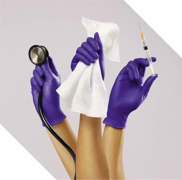 Three gloved hands, holding a stethoscope, cloth and syringe respectively 